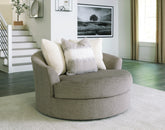 Tampa Furniture Outlet Lutz - Ashley Furniture - Creswell Living Room - Oversized Swivel Accent Chair / Stone - 1530521